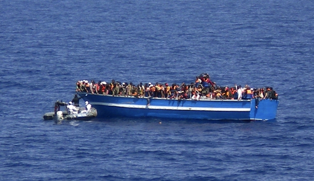 Migranti taliansko