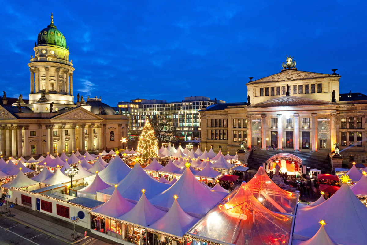 Traditional Christmas Market at Gendarmenmarkt, illuminated at dusk, Berlin, Germany, Europe