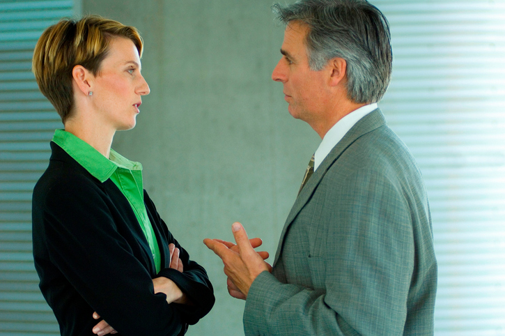 Two business colleagues having a discussion.