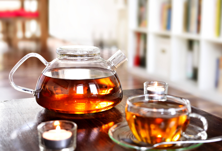 Teatime scene, cup of tea and teapot