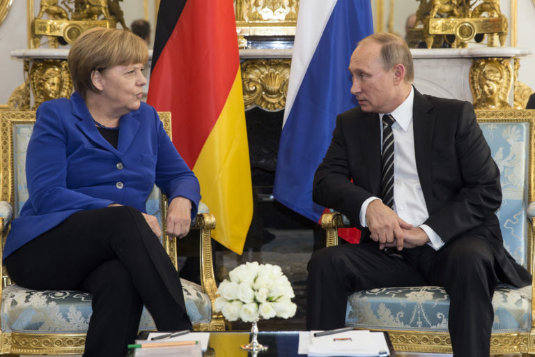 Putin, Merkelová