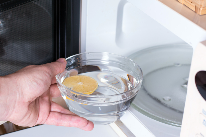 Cleaning the microwave oven