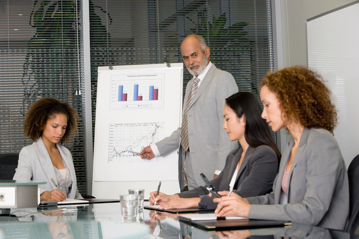 Senior African businessman giving presentation