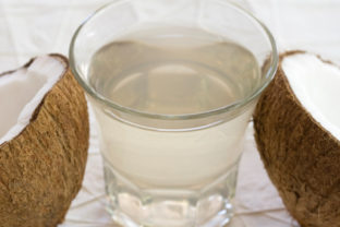 Coconut water with coconut halves