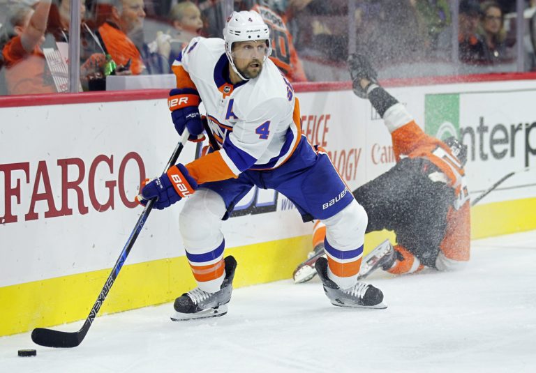 Dennis Seidenberg, Taylor Leier