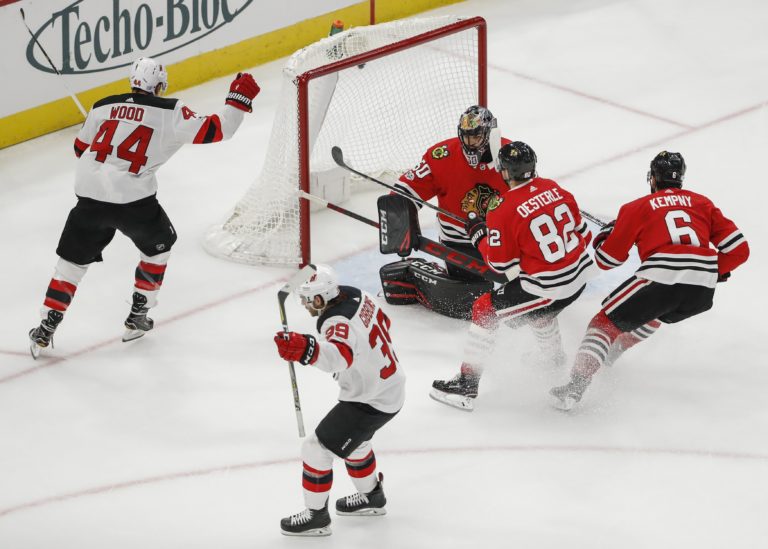 Brian Gibbons, Corey Crawford