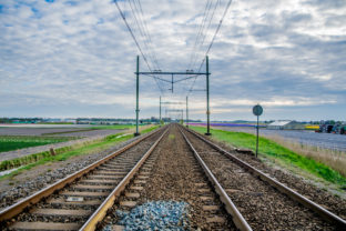 Train road with some clouds and blue sky