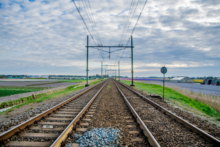 Train road with some clouds and blue sky