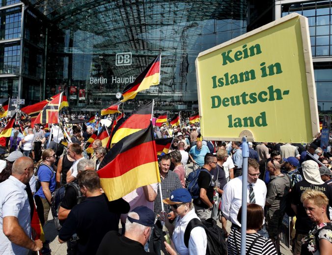 Nemecko, migranti, protest