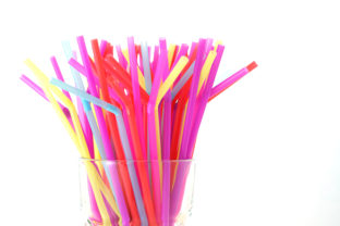 Banning plastic straws enviromental concerns concept.