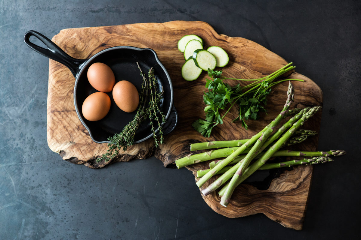 Wooden board with lunch ingredients