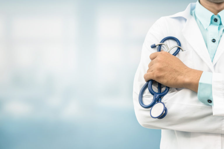 Doctor in hospital background with copy space