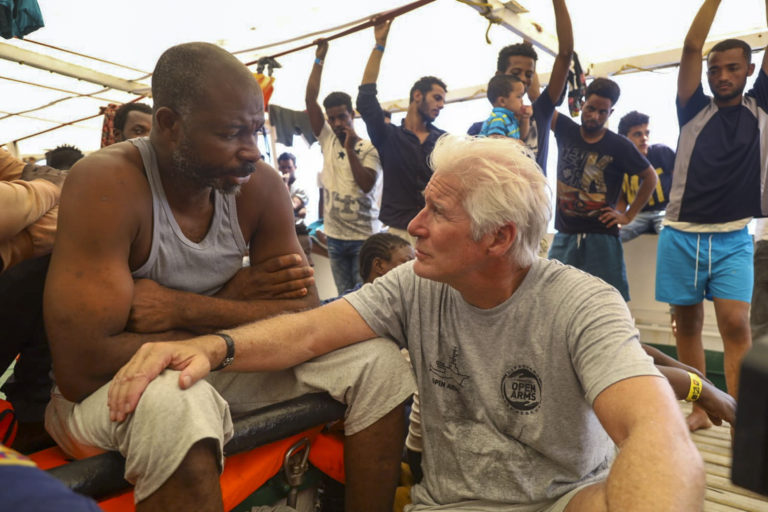 Richard Gere, migranti, utečenci