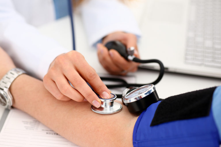 Female doctor arms make medic procedure closeup