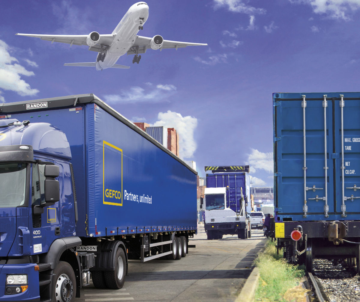 Forklift handling container box loading to freight train