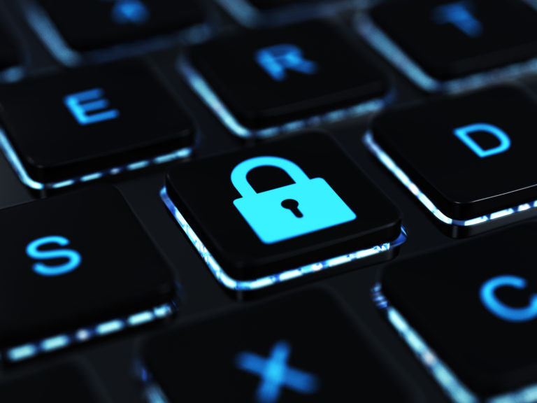 A close up of a lock key on a keyboard