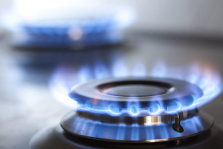 Kitchen gas cooker with burning fire propane gas