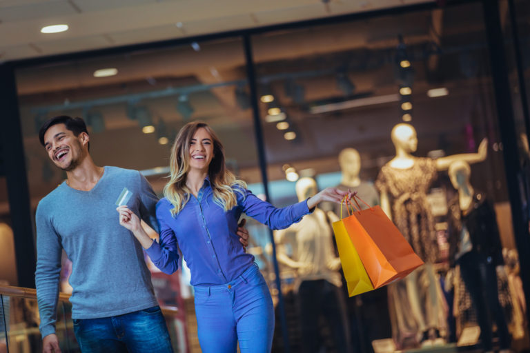 Couple shopping with a credit card