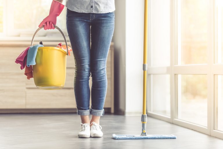 Woman cleaning her house