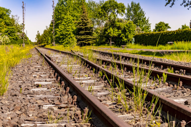 Low angle shot of a disused railway track in Brandenburg, Germany, which is only used for trips with a draisine.