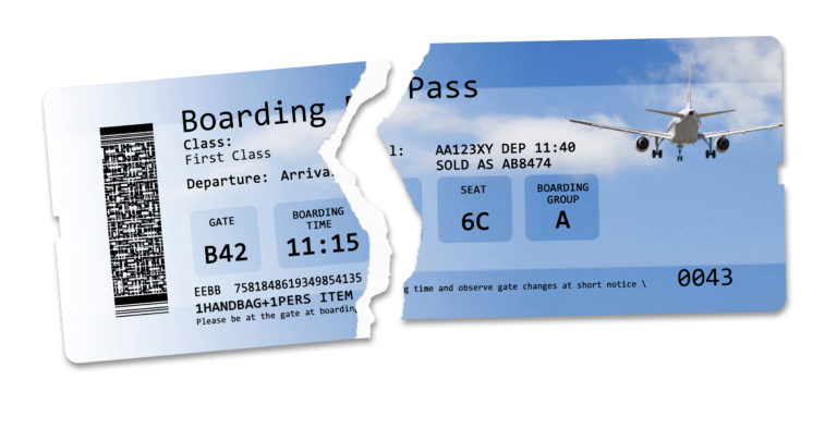 Flight cancelled concept image with ripped flight ticket - The image is totally invented and does not contain under copyright parts