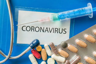 Novel coronavirus disease 2019 nCoV written on blue folder.