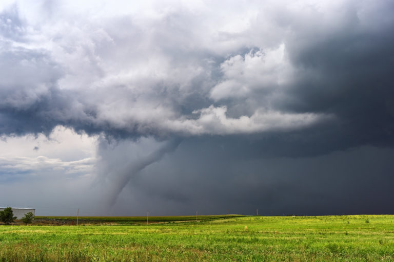 Tornado beneath a supercell thunderstorm