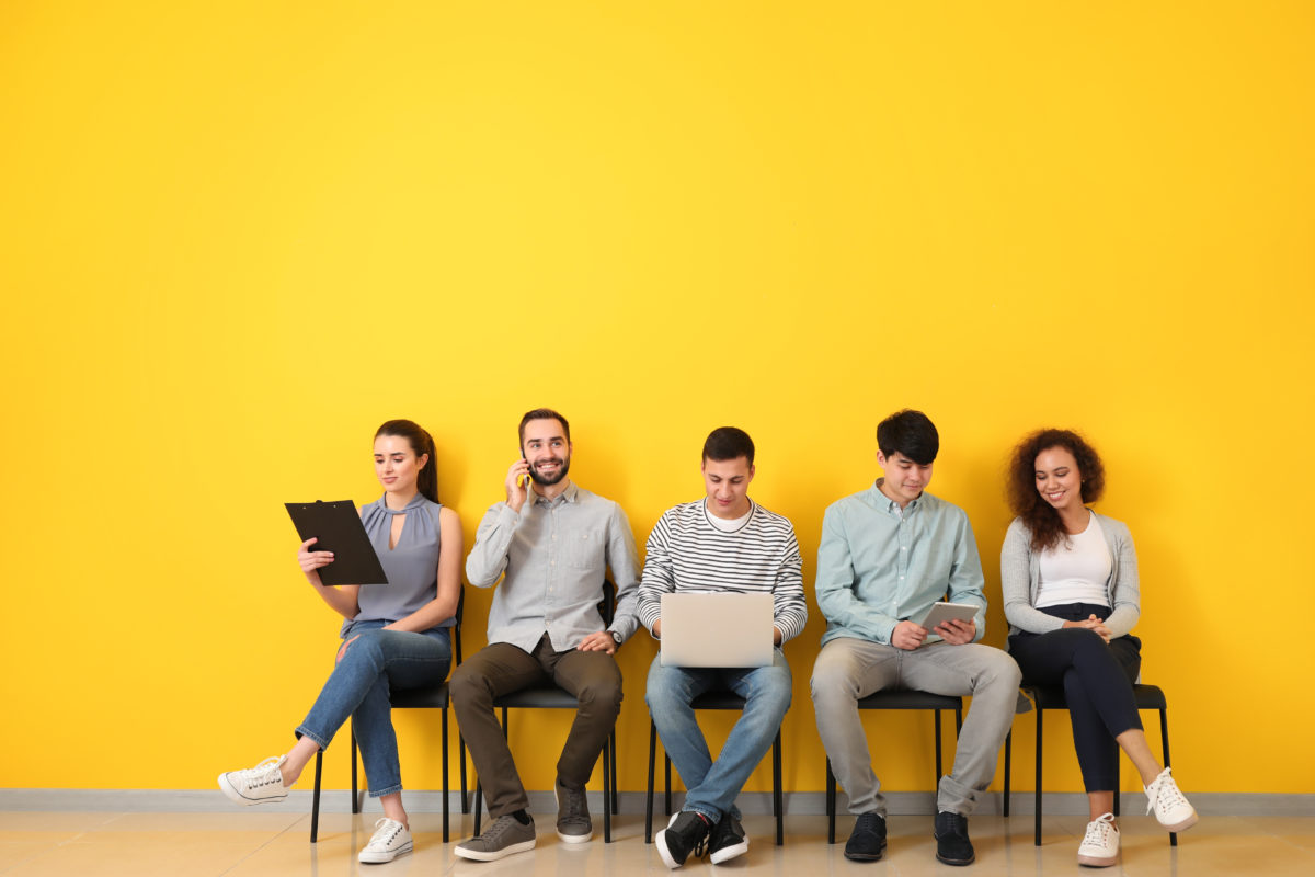 Young people waiting for job interview indoors