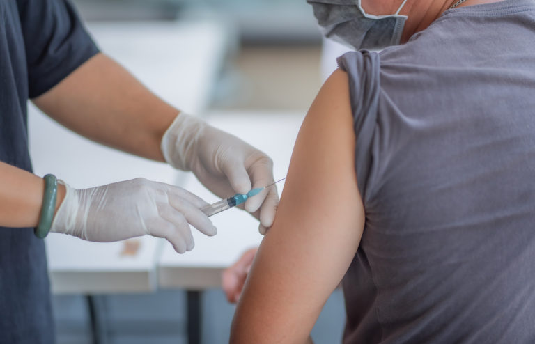 Injections in the arm to treat the disease.