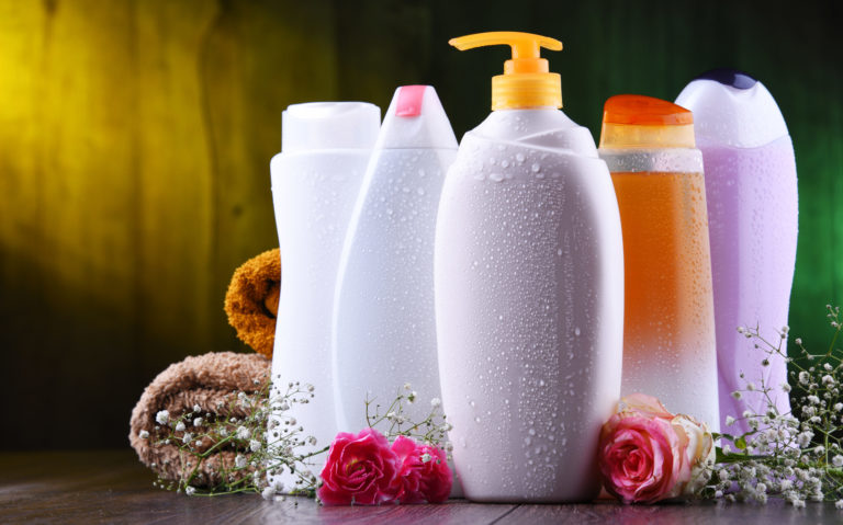 Plastic bottles of body care and beauty products