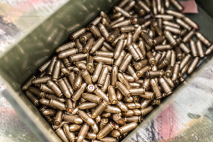Top view of gun ammunition box. Bullets for pistol