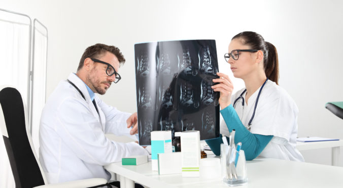Doctors examining x ray