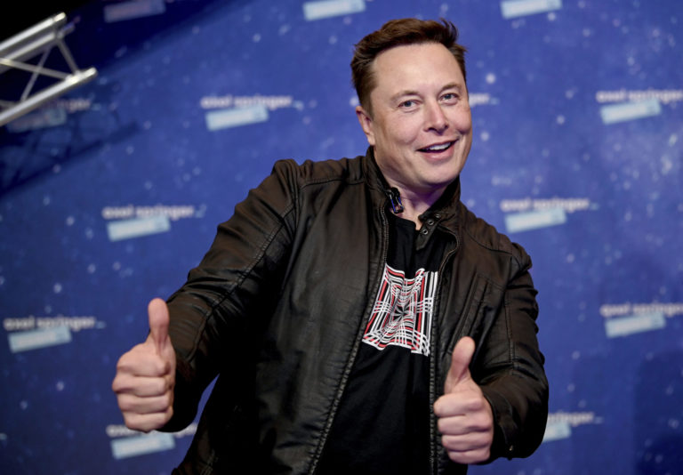 SpaceX owner and Tesla CEO Elon Musk arrives on the red carpet for the Axel Springer media award, in Berlin, Germany, Tuesday, Dec. 1, 2020. ()