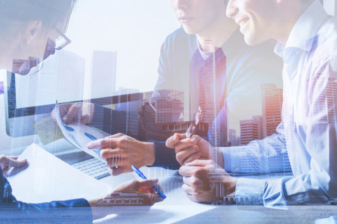 Business people working on marketing plan, double exposure