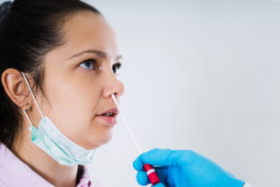 Doctor Taking Mouth Fluid Swab Sample