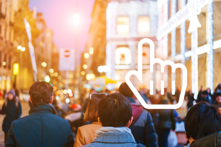 People crowd walking on busy street