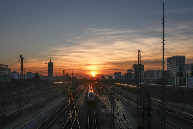 Sunset on the railroad and train station