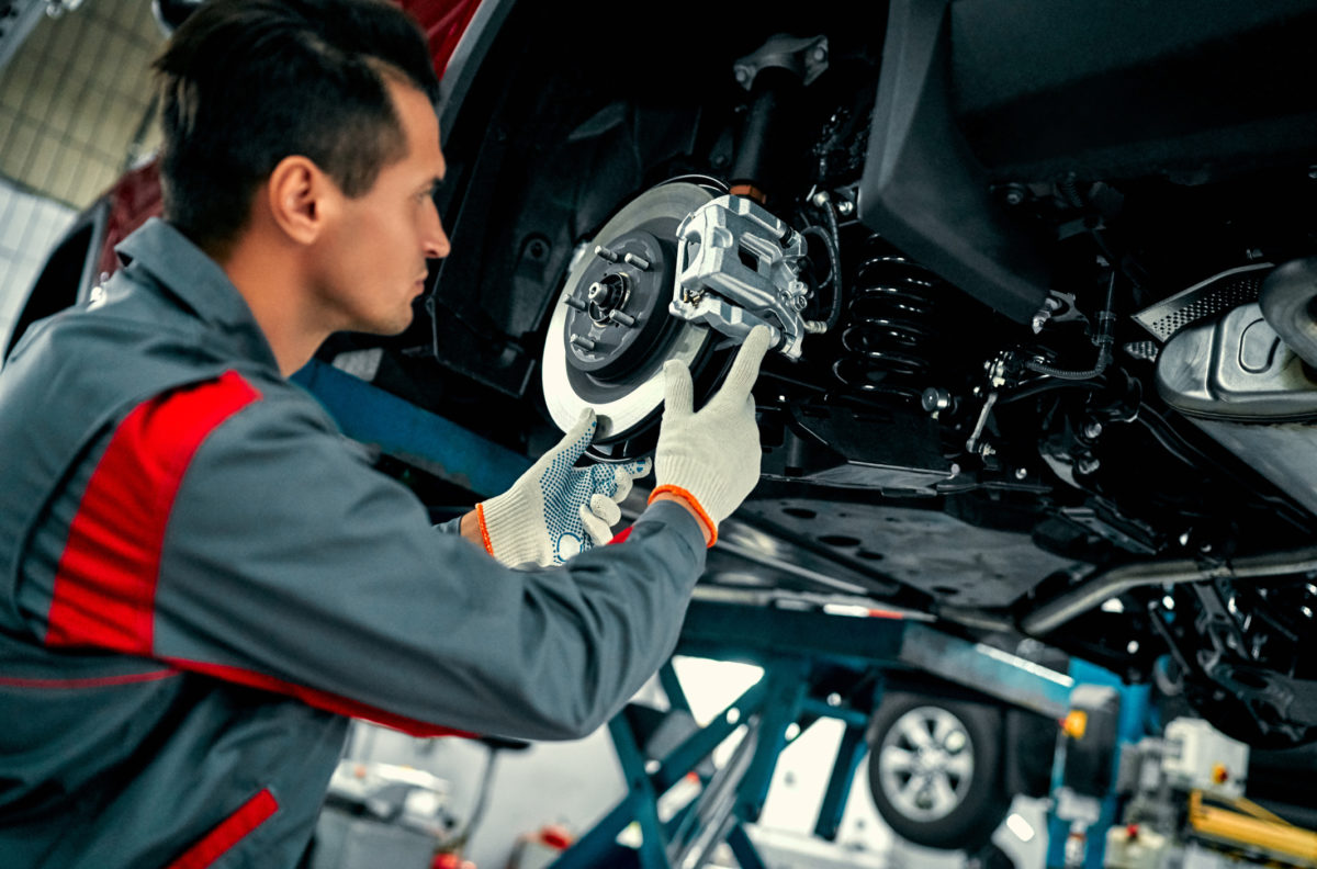 Handsome mechanic in uniform.