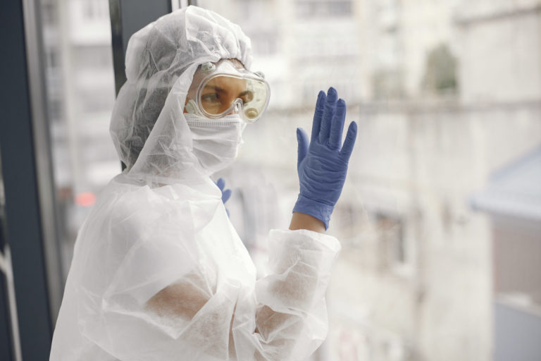Women doctor wearing protective suit