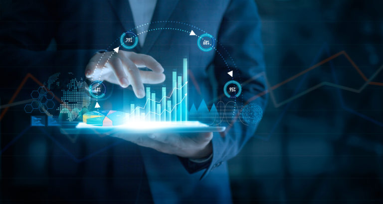 Businessman using tablet analyzing sales data and economic growth graph chart on virtual interface. Business strategy. Abstract icon. Digital marketing.