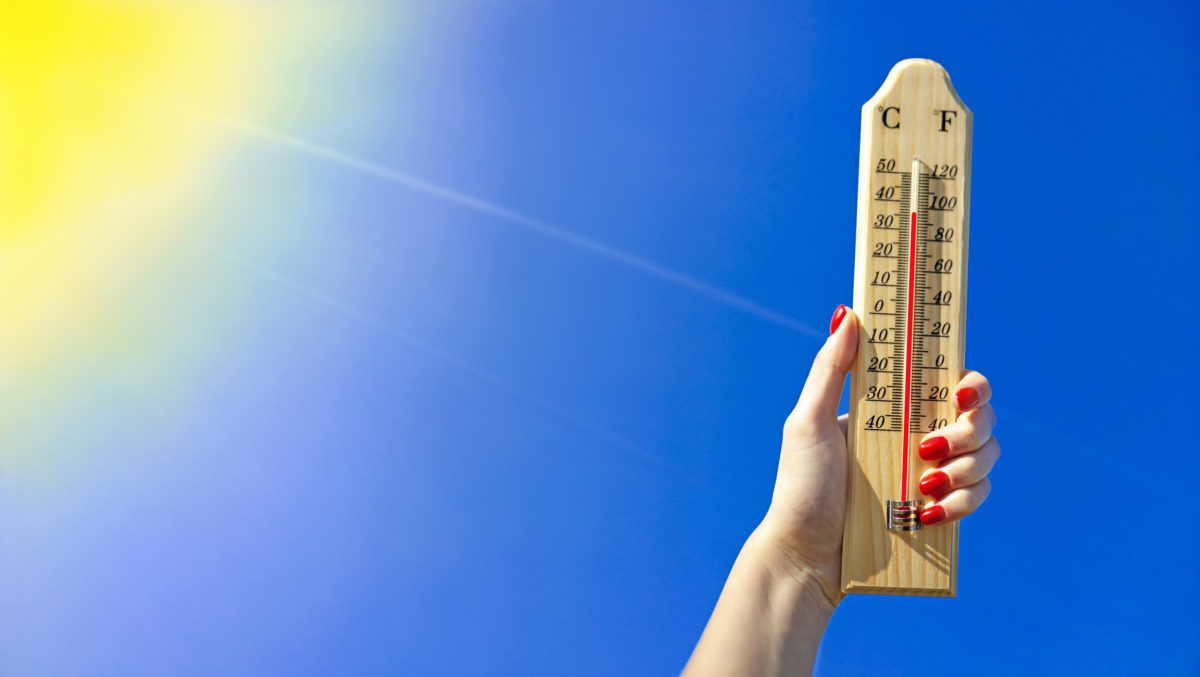 Thermometer Against a Bright Blue Sky