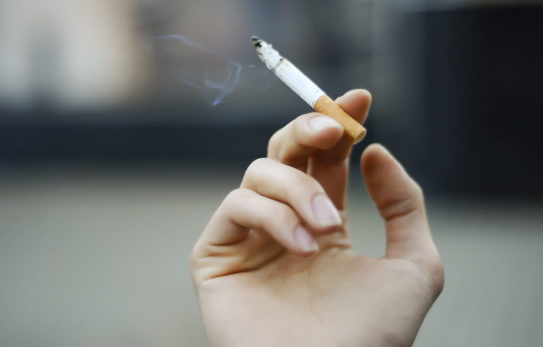 Cigarette in the hand