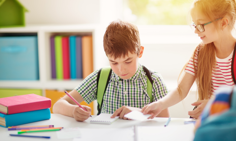 Children,With,Rucksacks,Standing,In,The,Park,Near,School.,Pupils