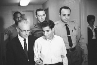 FILE - In this June 28, 1968, file photo, Sirhan Bishara Sirhan is escorted by his attorney, Russell E. Parsons from Los Angeles county jail chapel to enter plea to charge of murder in Los Angeles. U.S. Sen. Robert F. Kennedy's assassin was granted parole Friday, Aug. 27, 2021, after two of RFK's sons spoke in favor of Sirhan Sirhan’s release and prosecutors declined to argue he should be kept behind bars. ()