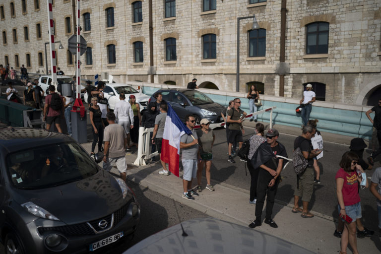 Virus Outbreak France Protests