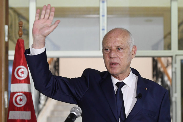 Tunisia President FILE - In this Sept.20, 2021 file photo, Tunisian President Kais Saied delivers a speech during his visit to Sidi Bouzid, Tunisia, Tunisian President Kaïs Saied issued presidential decrees bolstering the already near total power he granted himself two months ago. Wednesday's decrees include the continuing suspension of the Parliament's powers and the ongoing suspension of all MPs' immunity from prosecution.