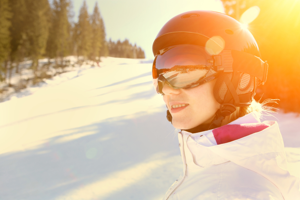 Woman,Wearing,A,Helmet,And,Glasses,On,The,Background,Of