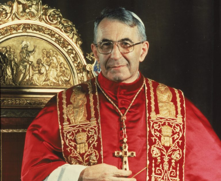 A 1978 photo of Pope John Paul I standing before the papal throne in Vatican City. Pope Francis has approved crediting a miraculous healing to one of his late predecessors, John Paul I. Francis' signing off on the 2011 recovery in Argentina of a child moves John Paul I along the path toward possible sainthood. John Paul was pontiff from Sept. 3 till Sept. 28, 1978, when he was found dead in his bed. ()