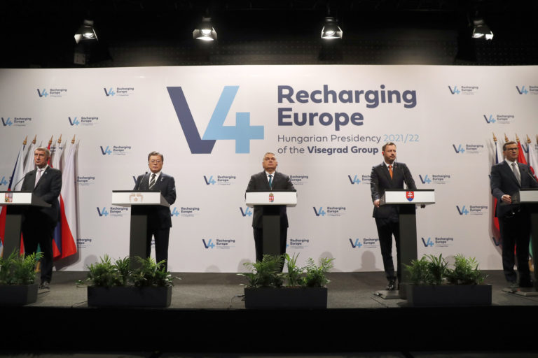 South Korea President Moon Jae-in, second from left, Hungary's Prime Minister Viktor Orban, center, Poland's Prime Minister Mateusz Morawiecki, right, Slovakia's Prime Minister Eduard Heger, second from right, and Czech Republic's Prime Minister Andrej Babis, left, stand during statements after a meeting of central Europe's informal body of cooperation called the Visegrad Group or V4, in Budapest, Hungary, Thursday, Nov. 4, 2021. ()