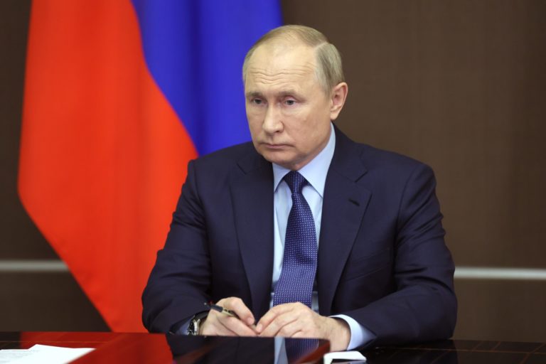 Russian President Vladimir Putin attends a cabinet meeting via video link, at the Bocharov Ruchei residence in the Black Sea resort of Sochi, Russia, Wednesday, Nov. 24, 2021. ()